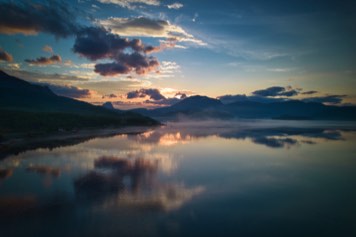 Mist (fog) in Sagfjorden in the sunset.