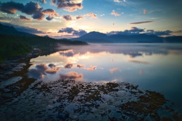 Mist (fog) in Sagfjorden in the sunset.