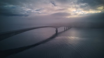 Dyrøya Bridge in low clouds