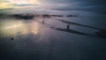 Dyrøya Bridge in low clouds